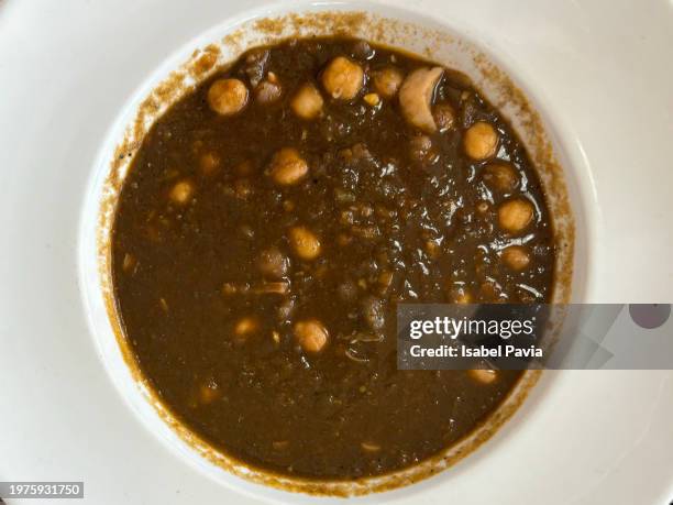 chickpeas with cuttlefish - fischmousse stock-fotos und bilder