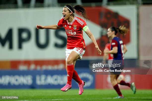 Carole Costa of SL Benfica celebrates after Lucy Bronze of FC Barcelona scores an own goal and the team's fourth goal during the UEFA Women's...