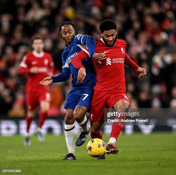 Joe Gomez of Liverpool competing with Raheem Sterling of Chelsea during the Premier League match between Liverpool FC and Chelsea FC at Anfield on...