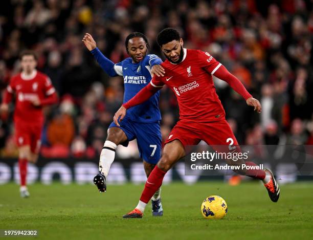 Joe Gomez of Liverpool competing with Raheem Sterling of Chelsea during the Premier League match between Liverpool FC and Chelsea FC at Anfield on...