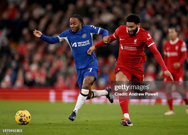 Joe Gomez of Liverpool competing with Raheem Sterling of Chelsea during the Premier League match between Liverpool FC and Chelsea FC at Anfield on...