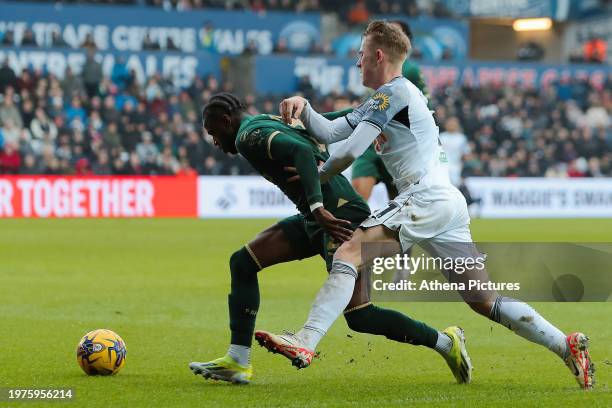 Bali Mumba of Plymouth Argyle challenged by Oliver Cooper of Swansea City during the Sky Bet Championship match between Swansea City and Plymouth...