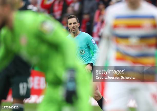 Referee Benjamin Brand looks on during the Bundesliga match between 1. FSV Mainz 05 and SV Werder Bremen at MEWA Arena on February 3, 2024 in Mainz,...