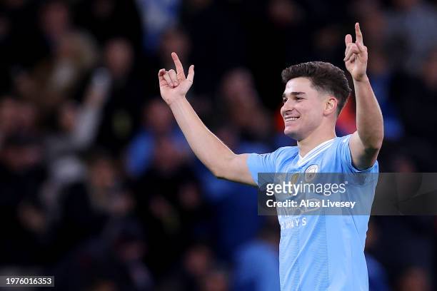 Julian Alvarez of Manchester City celebrates scoring his team's second goal during the Premier League match between Manchester City and Burnley FC at...