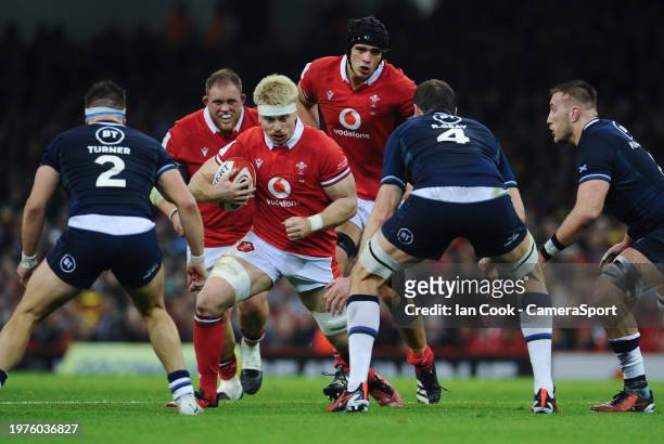Wales Aaron Wainwright look for a way through the Scottish defence during the Guinness Six Nations 2024 match between Wales and Scotland at...