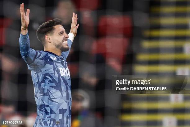 Aston Villa's Spanish defender Alex Moreno celebrates scoring his team fifth goal during the English Premier League football match between Sheffield...