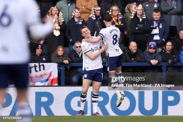 Preston North End's Emil Riis Jakobsen and Preston North End's Alan Browne celebrate after Ipswich Town's George Edmundson scores an own goal during...