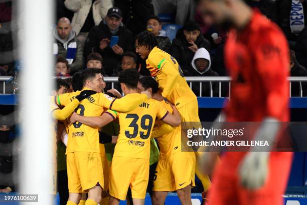 Barcelona players celebrate their second goal scored by Barcelona's German midfielder Ilkay Gundogan during the Spanish league football match between...