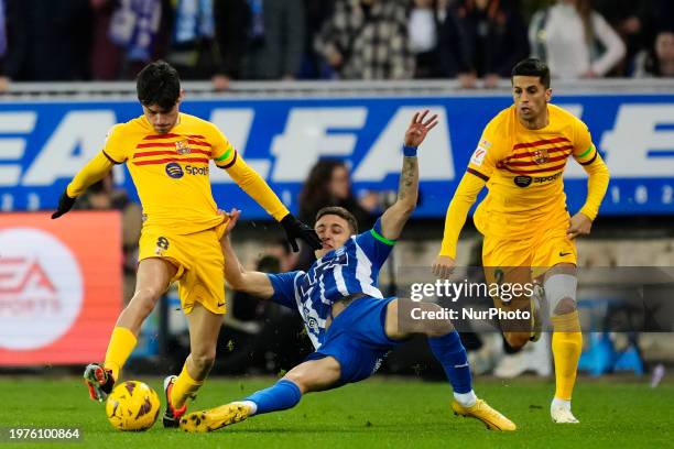 Pedri central midfield of Barcelona and Spain and Antonio Blanco Defensive Midfield of Alaves and Spain compete for the ball during the LaLiga EA...