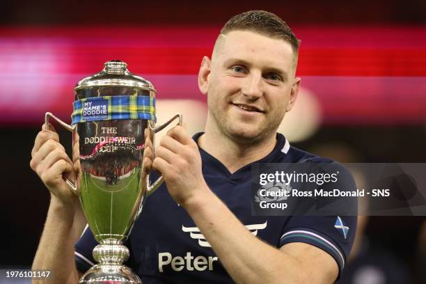 Scotland's Finn Russell with the Doddie Weir Cup during a Guinness Six Nations match between Wales and Scotland at the Principality Stadium, on...