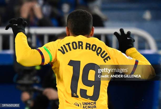 Barcelona's Brazilian forward Vitor Roque celebrates scoring his team's third goal during the Spanish league football match between Deportivo Alaves...