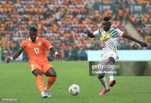 Serge Aurier of Ivory Coast and Adama Traore of Mali compete during the Africa Cup of Nations Quarter-Final match between Mali and Ivory Coast at...