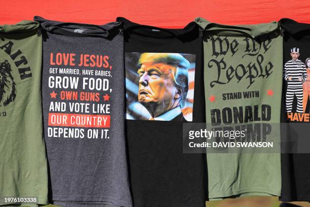 Trump t-shirts are for sale at a Take Our Border Back Convoy near the Mexico-US border in San Ysidro, California, on February 3, 2024. The Take Our...