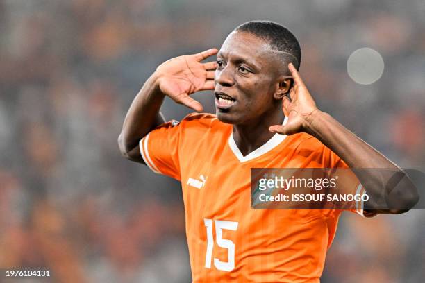 Ivory Coast's forward Max-Alain Gradel celebrates the victory at the end of the Africa Cup of Nations 2024 quarter-final football match between Mali...