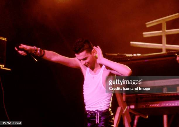 English musician Dave Gahan, of the English electronic music band Depeche Mode, sings on stage during the 1986 Black Celebration Tour at the Pine...