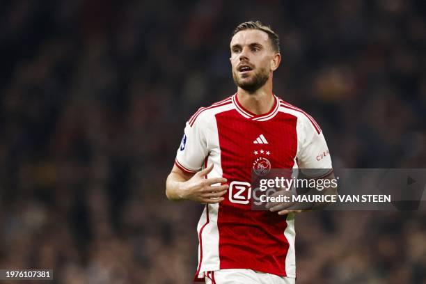 Ajax's English midfielder Jordan Henderson looks on during the Dutch Eredivisie football match between Ajax Amsterdam and PSV Eindhoven at the Johan...