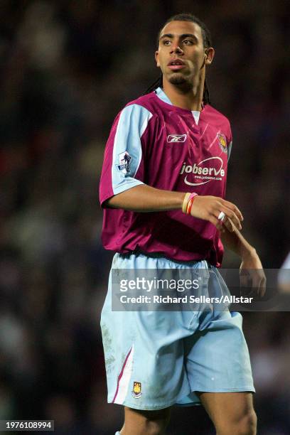 December 10: Anton Ferdinand of West Ham United running during the Premier League match between Blackburn Rovers and West Ham United at Ewood Park on...