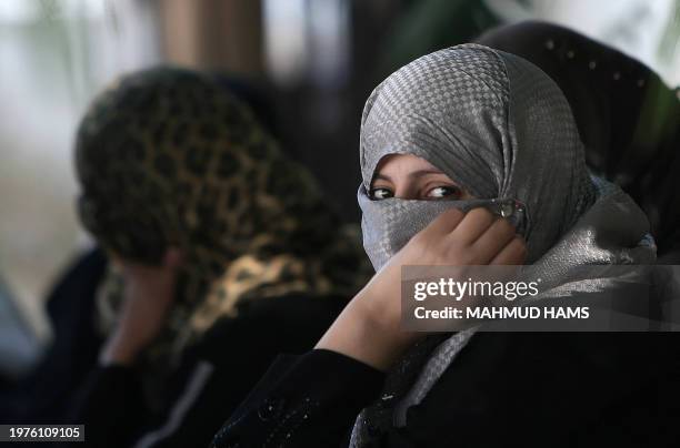 Palestinian women attend a demonstration in support of Palestinian leader Mahmud Abbas' bid for statehood recognition at the United Nations on...