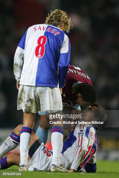 December 10: Robbie Savage and Morten Gamst Pedersen of Blackburn Rovers with Anton Ferdinand of West Ham United in incident during the Premier...