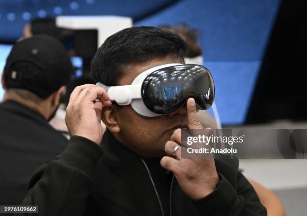 Customers check Apple Vision Pro mixed reality headset at Apple store in New York, United States on February 03, 2024.