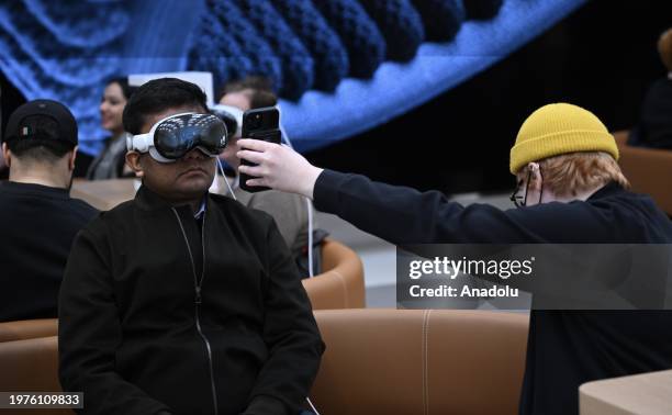 Customers check Apple Vision Pro mixed reality headset at Apple store in New York, United States on February 03, 2024.