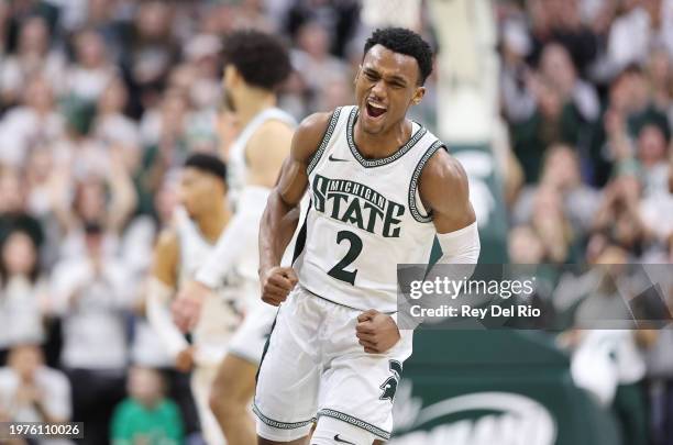 Tyson Walker of the Michigan State Spartans celebrates his made basket during the second half against the Maryland Terrapins at Breslin Center on...