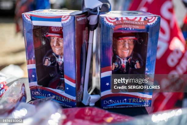 Pair of bobble heads depicting former President Donald Trump are seen at the Take Back Our Border Convoy rally at Cornerstone Children's Ranch on...