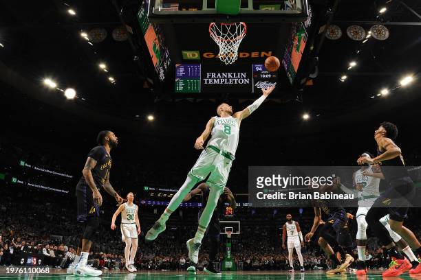 Kristaps Porzingis of the Boston Celtics rebounds the ball during the game against the Los Angeles Lakers on February 1, 2024 at the TD Garden in...