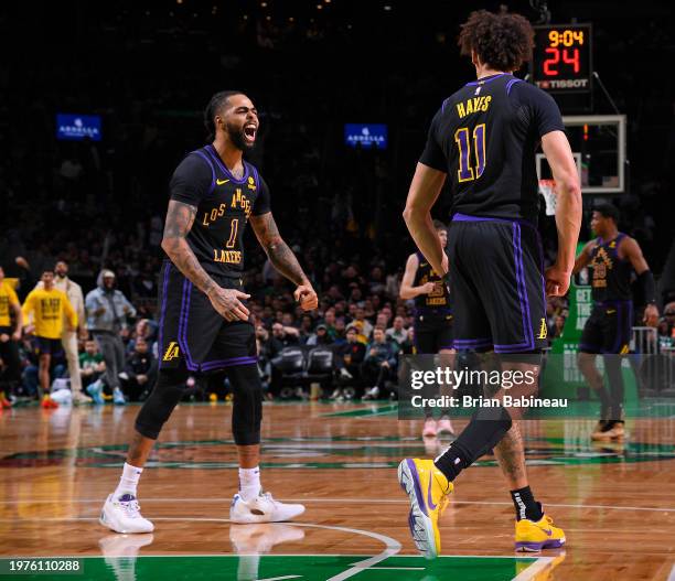 Angelo Russell and Jaxson Hayes of the Los Angeles Lakers celebrates during the game against the Boston Celtics on February 1, 2024 at the TD Garden...