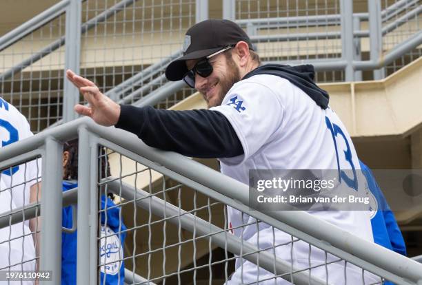 Los Angeles, CA Dodger Max Muncy waves to fans at DodgerFest 2024, the official kickoff celebration for the upcoming season of Dodger baseball at...