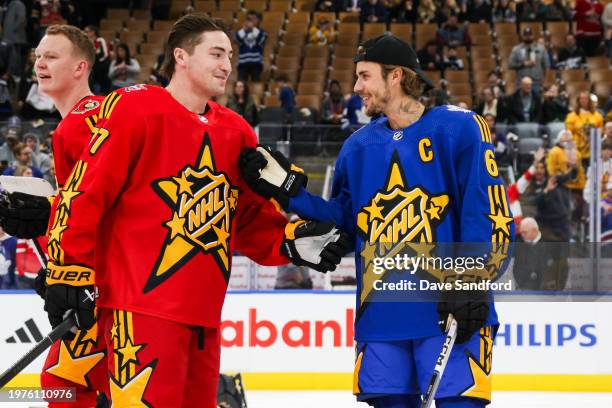 Frank Vatrano of the Anaheim Ducks and Justin Bieber chat during the 2024 Honda NHL All-Star Game at Scotiabank Arena on February 03, 2024 in...