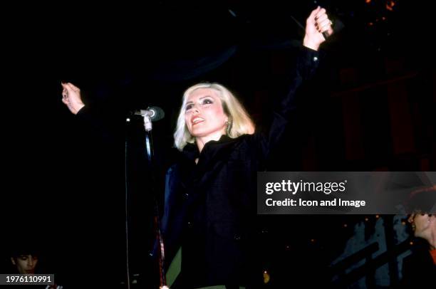 American singer Debbie Harry, of the American rock band Blondie, sings on stage during the 1982 Tracks Across America Tour at Pine Knob Music Theatre...