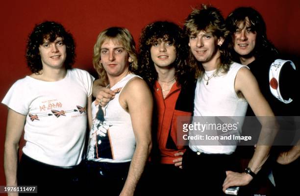 English musicians Rick Allen, Phil Collen, Rick Savage, Steve Clark and Joe Elliott, of the English rock band Def Leppard, pose for a group portrait...
