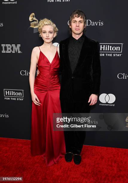 Julia Garner and Mark Foster at the Pre-GRAMMY Gala held at The Beverly Hilton on February 3, 2024 in Los Angeles, California.