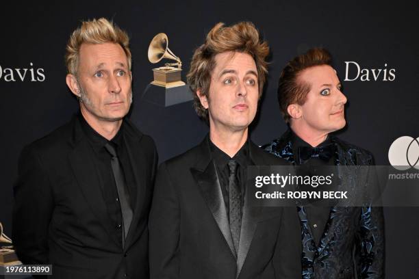 Green Day band members Mike Dirnt, Billie Joe Armstrong and Tre Cool arrive for the Recording Academy and Clive Davis' Salute To Industry Icons...