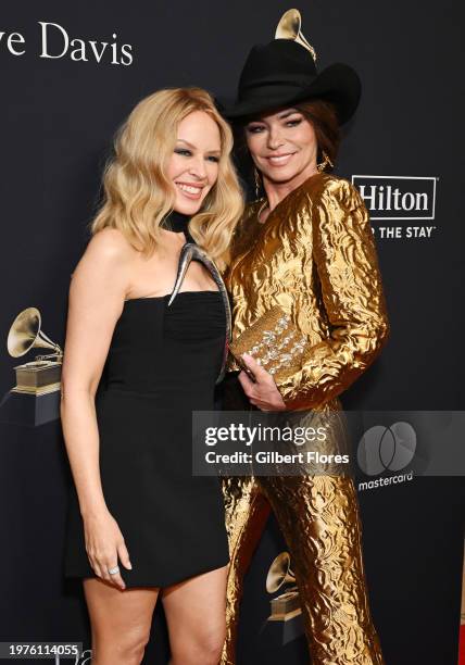 Kylie Minogue and Shania Twain at the Pre-GRAMMY Gala held at The Beverly Hilton on February 3, 2024 in Los Angeles, California.