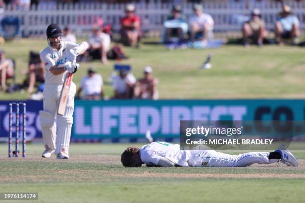 South Africa's Ruan de Swardt reacts after bowling during day one of the first cricket Test match between New Zealand and South Africa at the Bay...