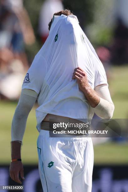 South Africa's Ruan de Swardt reacts after bowling during day one of the first cricket Test match between New Zealand and South Africa at the Bay...