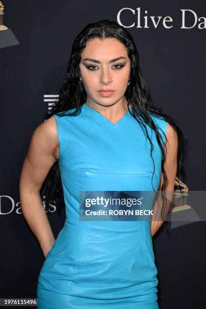 British singer Charli XCX arrives for the Recording Academy and Clive Davis' Salute To Industry Icons pre-Grammy gala at the Beverly Hilton hotel in...