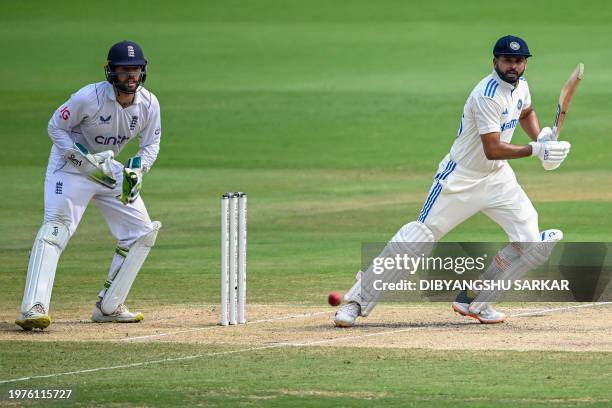 India's Shreyas Iyer plays a shot as England's Ben Foakes watches during the third day of the second Test cricket match between India and England at...