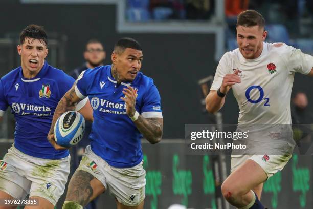 Monty Ioane of Italy is in action during the first match of the Guinness Six Nations tournament between Italy and England at the Stadio Olimpico in...