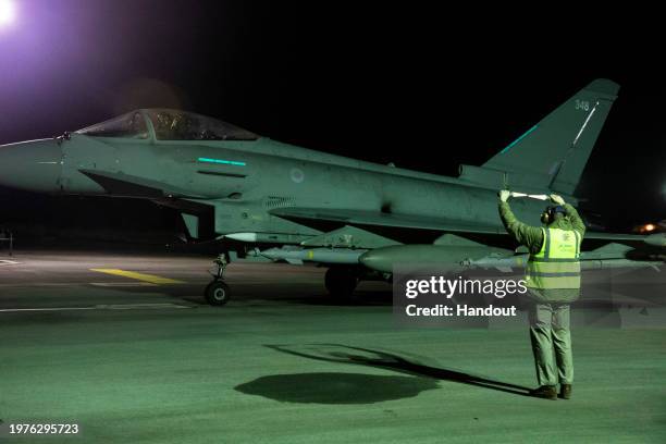 In this handout image provided by the UK Ministry of Defence, a Royal Air Force Typhoon FGR4 aircraft prepares to take-off to conduct further strikes...