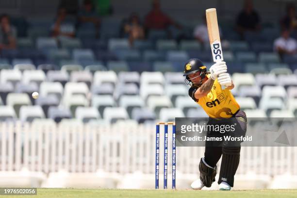 Josh Philippe of Western Australia watches the ball after his shot during the Marsh One Day Cup match between Western Australia and New South Wales...