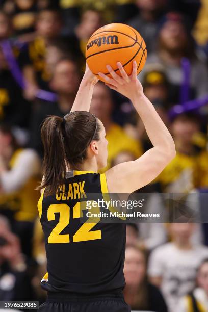 Caitlin Clark of the Iowa Hawkeyes shoots a three pointer ahduring the second half at Welsh-Ryan Arena on January 31, 2024 in Evanston, Illinois.