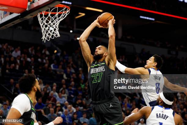 Rudy Gobert of the Minnesota Timberwolves goes up for a dunk against the Dallas Mavericks in the third quarter at Target Center on January 31, 2024...