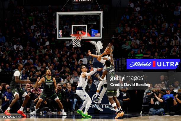 Seth Curry of the Dallas Mavericks goes to the basket against the Minnesota Timberwolves in the third quarter at Target Center on January 31, 2024 in...