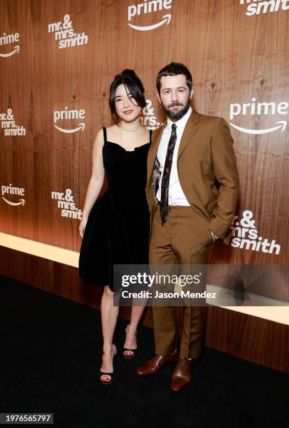 Maya Erskine and Michael Angarano attend the "Mr. & Mrs. Smith" red carpet premiere at The Weylin on January 31, 2024 in Brooklyn, New York.