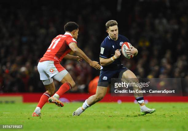 Scotland's Kyle Rowe takes on Wales Rio Dyer during the Guinness Six Nations 2024 match between Wales and Scotland at Principality Stadium on...