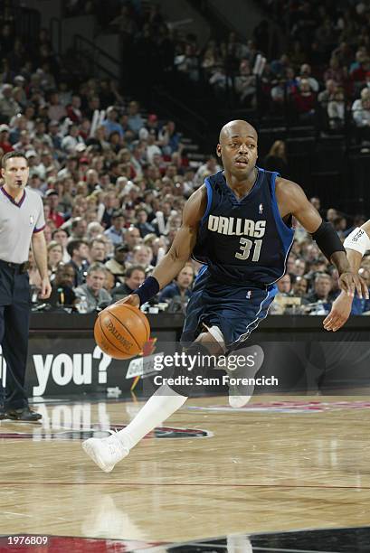 Nick Van Exel of the Dallas Mavericks drives against the Portland Trail Blazers in Game four of the Western Conference Quarterfinals during the 2003...