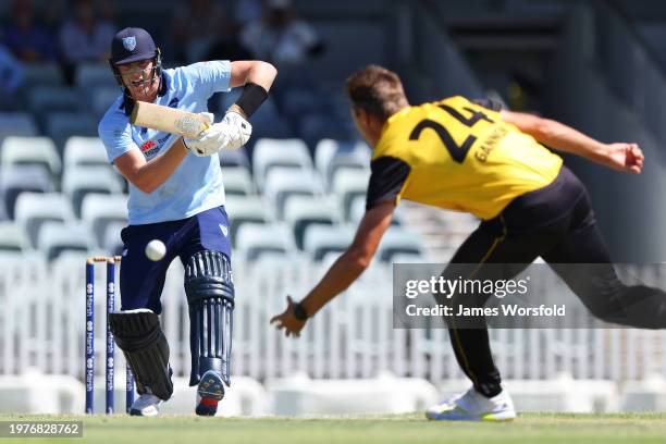 Jack Edwards of New South Wales watches the ball after his shot during the Marsh One Day Cup match between Western Australia and New South Wales at...